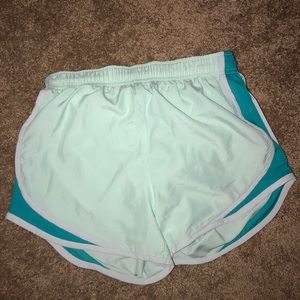 5 pairs of Nike track shorts & 1 Varsity brand